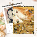 Calendrier mural 2026 autoportraits de chats foulard
