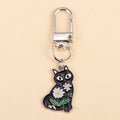 Porte-clés chat fleurs